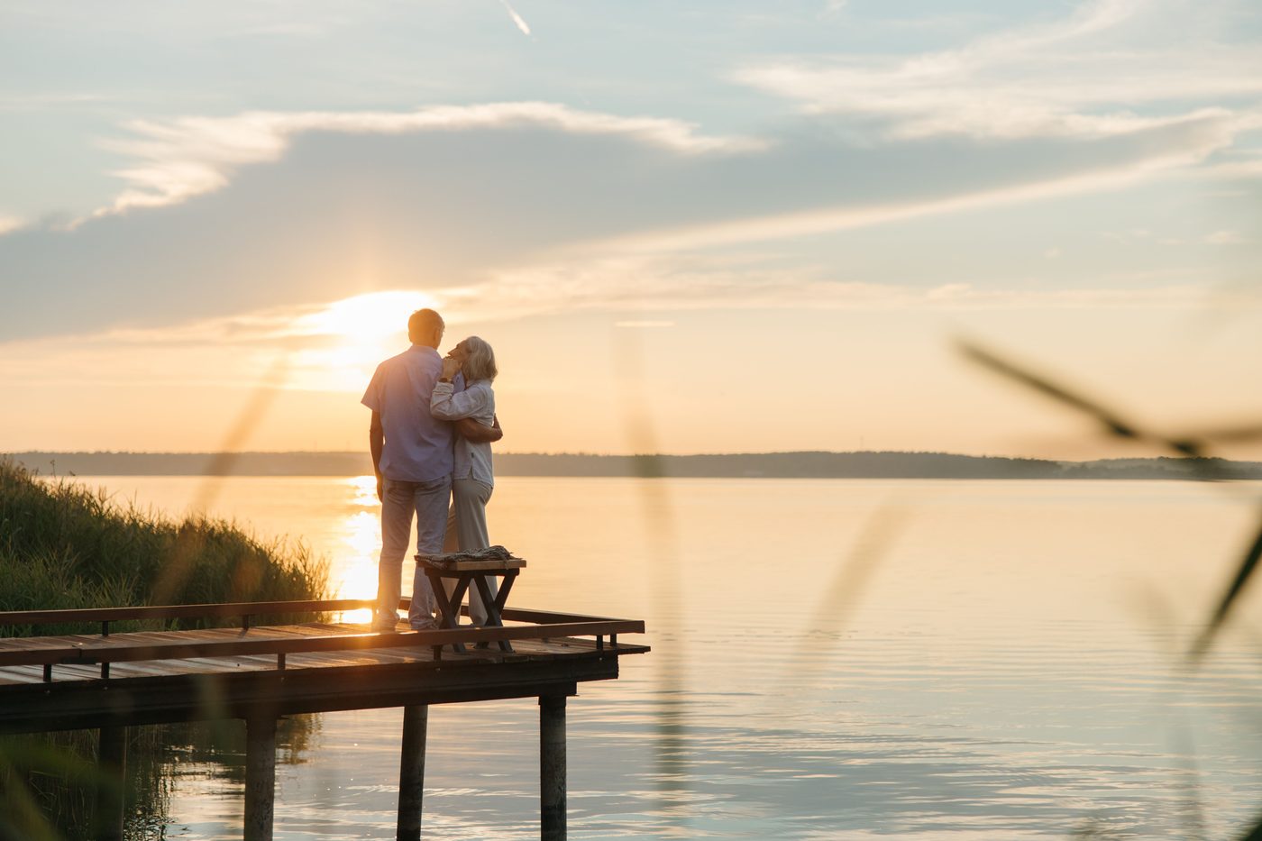 A family walking together outdoors at sunset